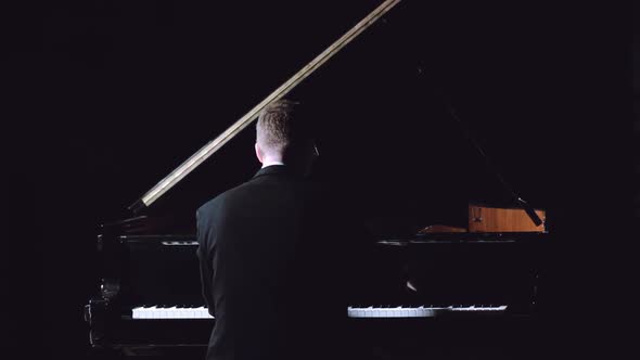 Musician Plays the Piano