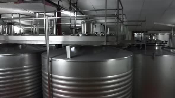 Industrial Stainless Steel Vats in Modern Brewery