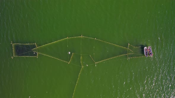 Aerial View to the Baltic Sea with the Fish Traps and Fishers