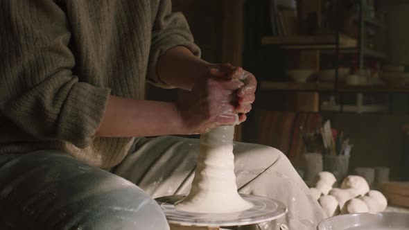 Potter Is Shaping Clay Vessel From Wet Clay