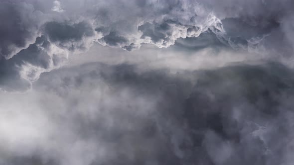 thick gray clouds moved across the sky