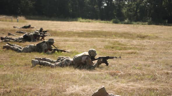 As Part of a Military Special Forces Unit's Attack on the Enemy a Group of Soldiers Armed