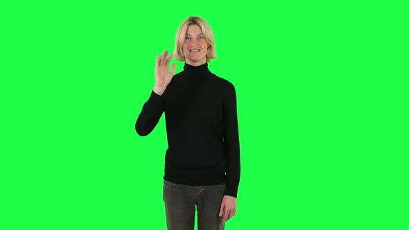 Blonde Guy Waving Hand and Showing Gesture Come Here. Green Screen