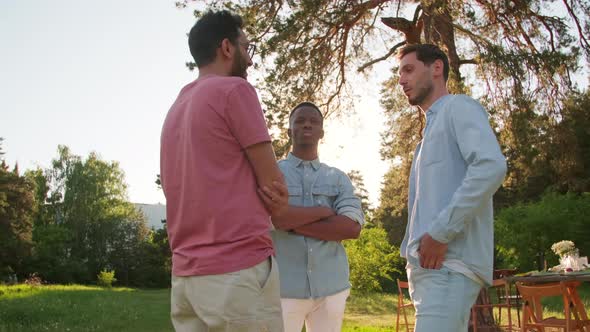 Three Male Friends Chatting