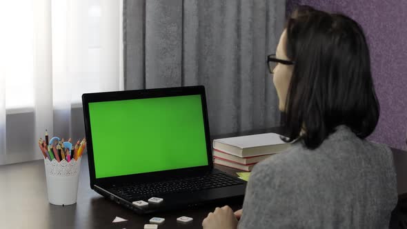 Woman Teacher Making Online Distance Education Video Call on Laptop Green Screen