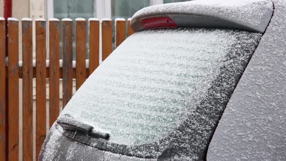 Motion Timelapse Of A Car Rear Window Frosting And Defrosting During Winter