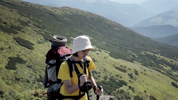 Woman Tourist walking on top of mountain. Hikers travel enjoy life scenic nature landscape