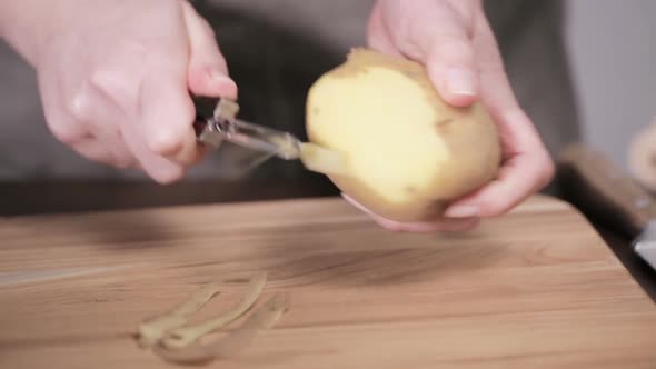 Step by step. Peeling Yukon gold potatoes for creamy mashed potatoes.