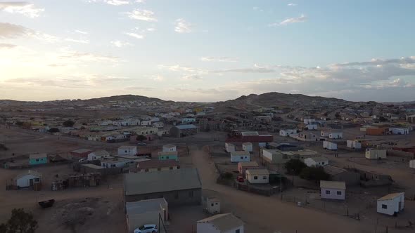 Cityscape of the beautiful Luderitz city with the buildings all over the hills