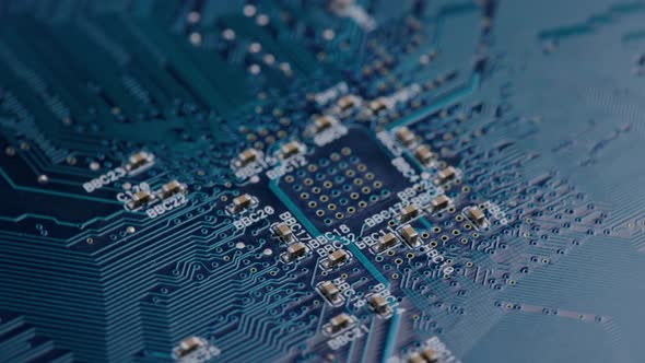 Computer Electronic Circuit Board with Radial Conductor Tracks and SMD Capacitors Rotating Macro