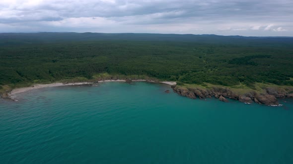 Drone flight above a picturesque rocky coastline