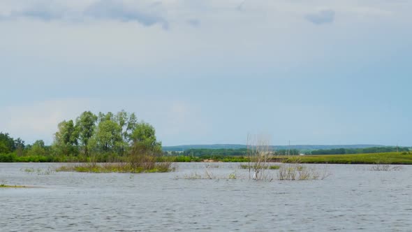 Clouds Are Moving Over Lake, Zoom Timelapse