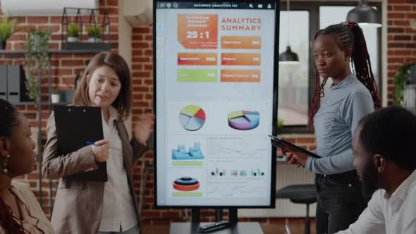 Group of Coworkers Meeting at Business Conference for Presentation