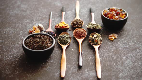 Spoons with Different Types of Dry Tea Leaves.