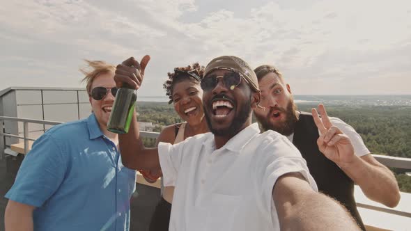 POV of Friends Taking Selfie on Rooftop and Partying