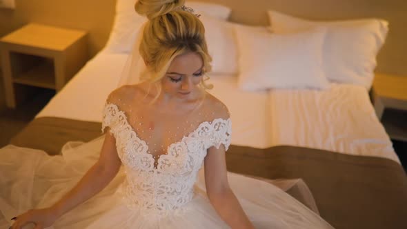 Cute Blonde Bride Wedding Dress Sits Hotel Room Looks You
