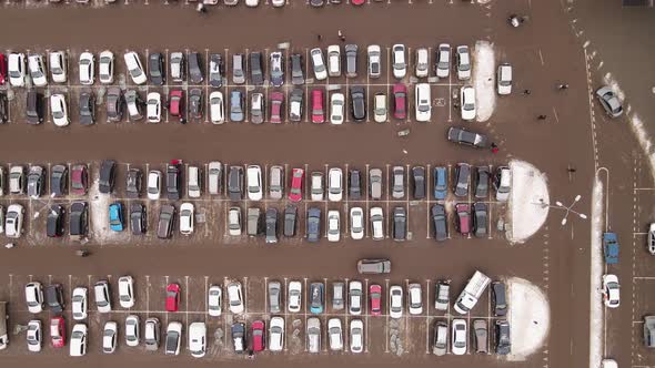 Cars Stand in Straight Rows in the Parking Lot Aerial View