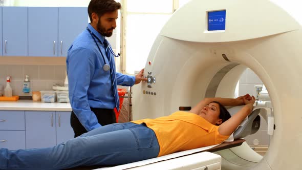 A patient is loaded into an mri machine