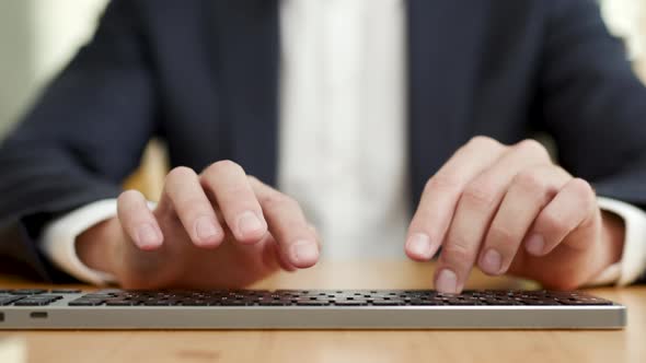 Closeup Working Businessman Typing on Computer Keyboard in Office