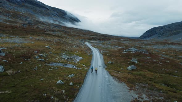 Epic Drone Shot of Young Cyclists Enjoying Ride