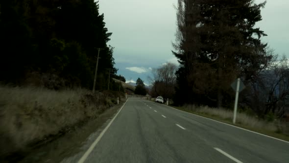 A first person view of driving through the beautiful country of New Zealand