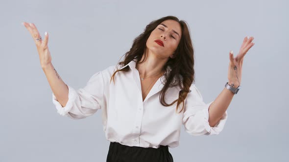 Model in White Shirt is Raising Hands Up Like Asking Why Grabbing Her Head Looking Disappointed and