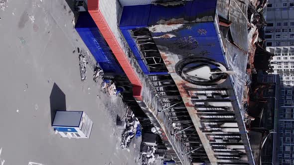 Vertical Video of the Consequences of the War in Ukraine  a Bombedout Shopping Center