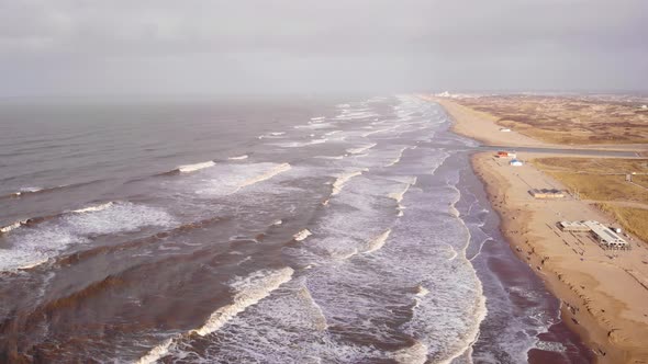 Aerial View Of Rough Sea Waves Along Katwijk aan Zee Beach Coastline In South Holland