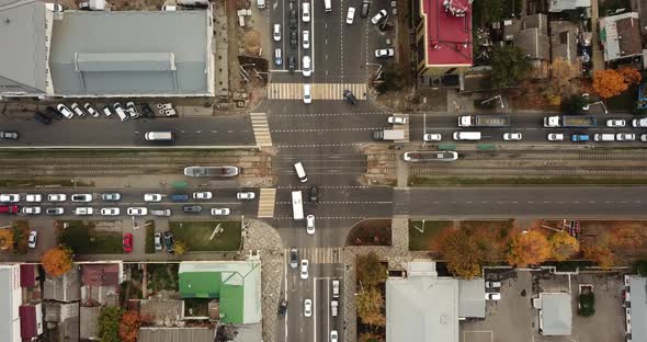 Top Down Drone Point of View - Steet City Road Intersection in Autumn Time