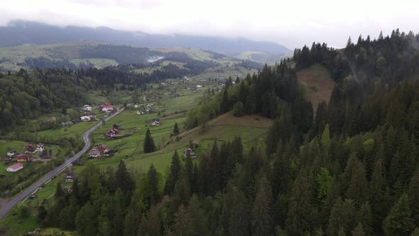 Village in the Mountains. Slow Motion. Carpathians. Ukraine. Aerial