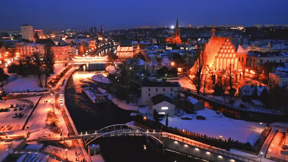 Downtown of Bydgoszcz at dusk in winter, Poland. Aerial view