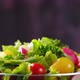Fresh vegetable salad from cucumber, tomato and lettuce on black background - VideoHive Item for Sale