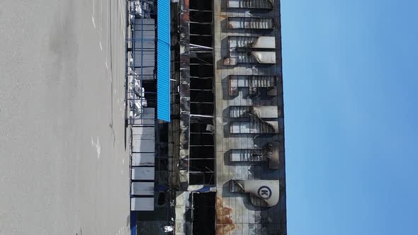 Vertical Video of a Destroyed Building of a Shopping Center in Bucha Ukraine