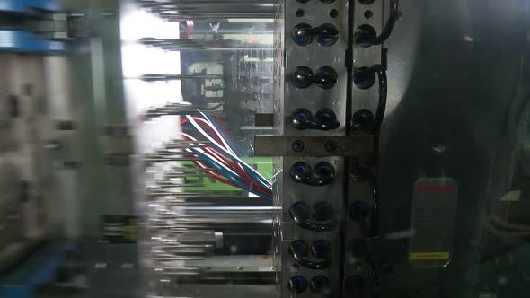 Automated production of plastic parts in a large factory