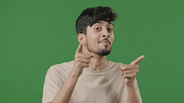 Smiling Arab Man Showing Hey you Hand Gesture Approve Good Idea Respect Sign Pretending Shooting