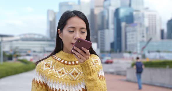 Woman use of cellphone in city