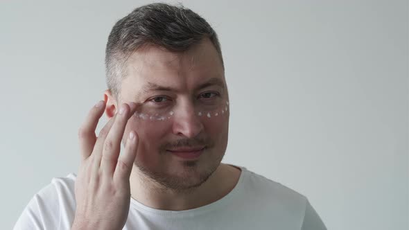 Male Skincare Facial Treatment Man Applying Cream