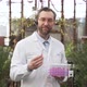 Scientist Holds Test Tubes with Plants in His Hands - VideoHive Item for Sale