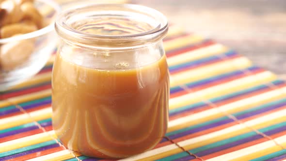 Caramel Chocolate Bar and Liquid on Table Top View