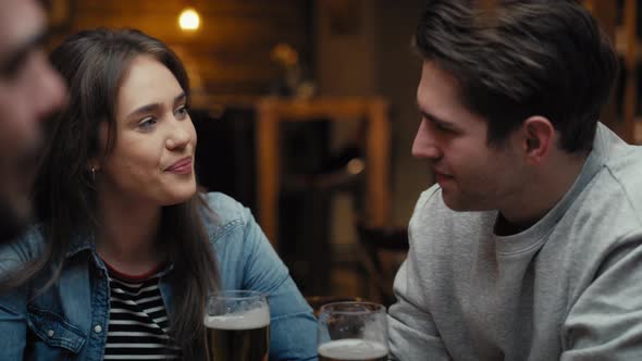 Two caucasian friends meeting in the pub. Shot with RED helium camera in 8K.