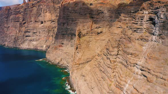 Drone Flight Over Peaks of High Rock Los Gigantes in Tenerife Island