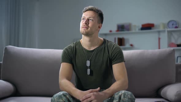 Dreamy Male Soldier Thinking About Long-Awaited Family Reunion