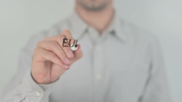 European Union Writing on Screen with Hand