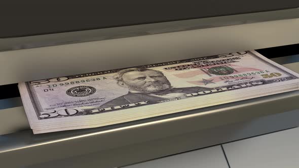 50 US dollar in cash dispenser. Withdrawal of cash from an ATM.