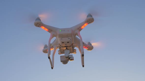 Quadcopter Flying in the Evening Sky