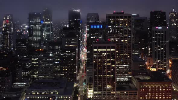  San Francisco at Night. Scenic Fog Is Covering Illuminated Skyscrapers. 