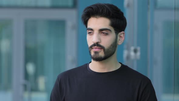 Attractive Darkhaired Middle Eastern Man Looking Away Thinking About Future Planning Work Day Turns