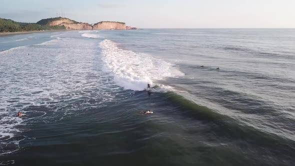 Professional Surfer Riding Perfect Sea Waves During Summer In Olon Beach, Ecuador. - Aerial Wide Sho