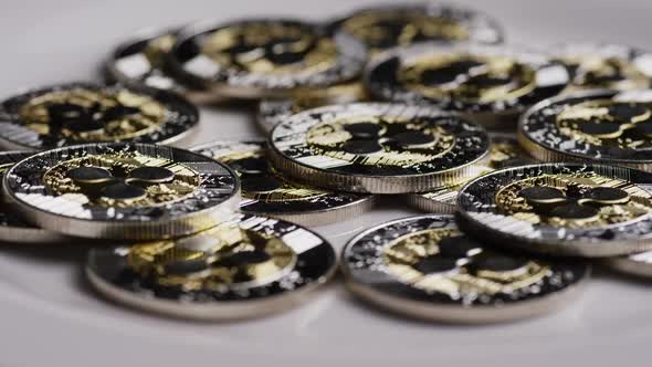 Rotating shot of Ripple Bitcoins (digital cryptocurrency) - BITCOIN RIPPLE 0055