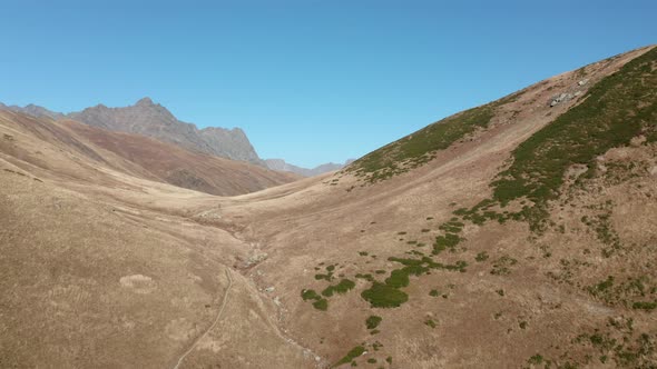 Amazing Aerial Landscape Mountain Plains and Fields on Highlands and Sky Background